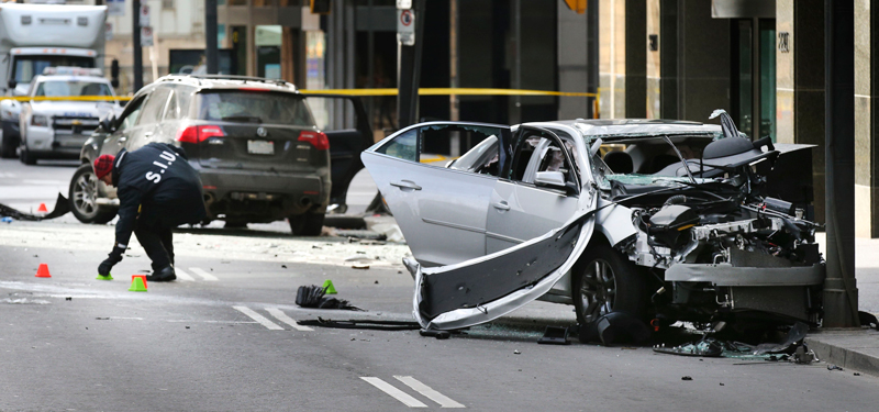 Photo of a car accident in Toronto involving an Uber drive.